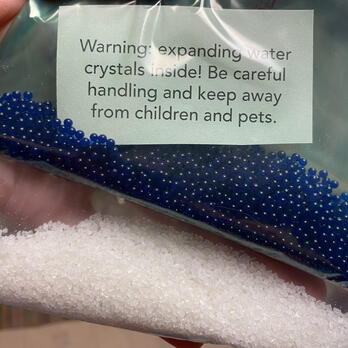 a bag of water beads and a bag of water crystals